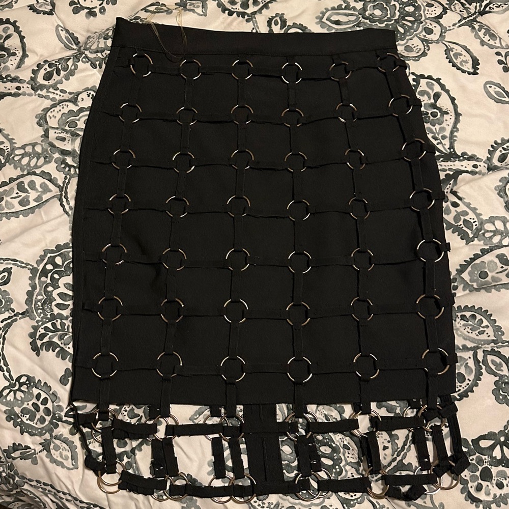 Large black skirt fits great on the body and hugs your curves